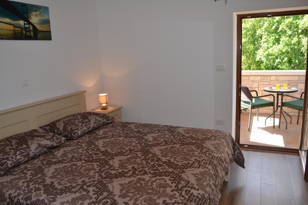 Holiday Home Mate Tinjan Quarto foto